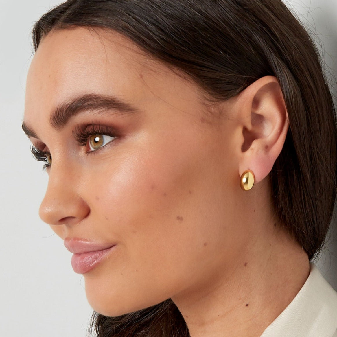 Gouden button oorbellen